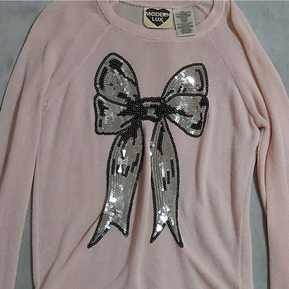 pastel pink sweater